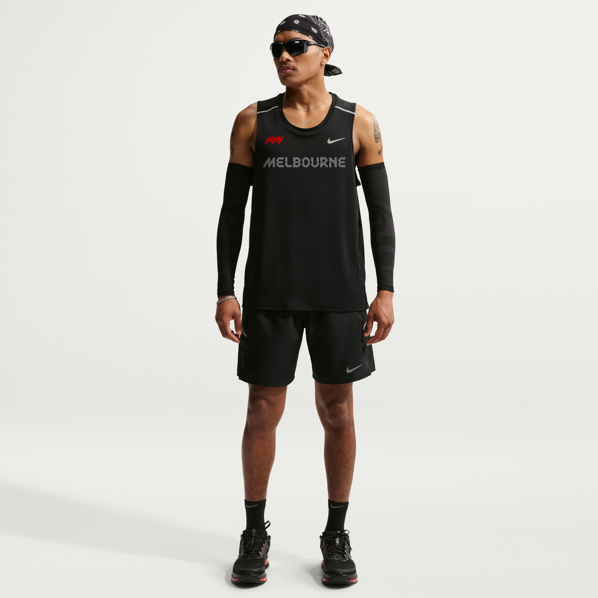 Nike Miler Men's Dri-FIT Running Tank Top - Black | Nike Melbourne Marathon Festival
